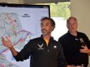 “We couldn’t do it without you.” USAF Marathon Race Director Robert Aguiar (left) at a pre-race meeting with amateur operators. Mike Crawford, KC8GLE (right), was Aguiar’s shadow during the event. [Bill Telzerow, KC8LQX, photo]